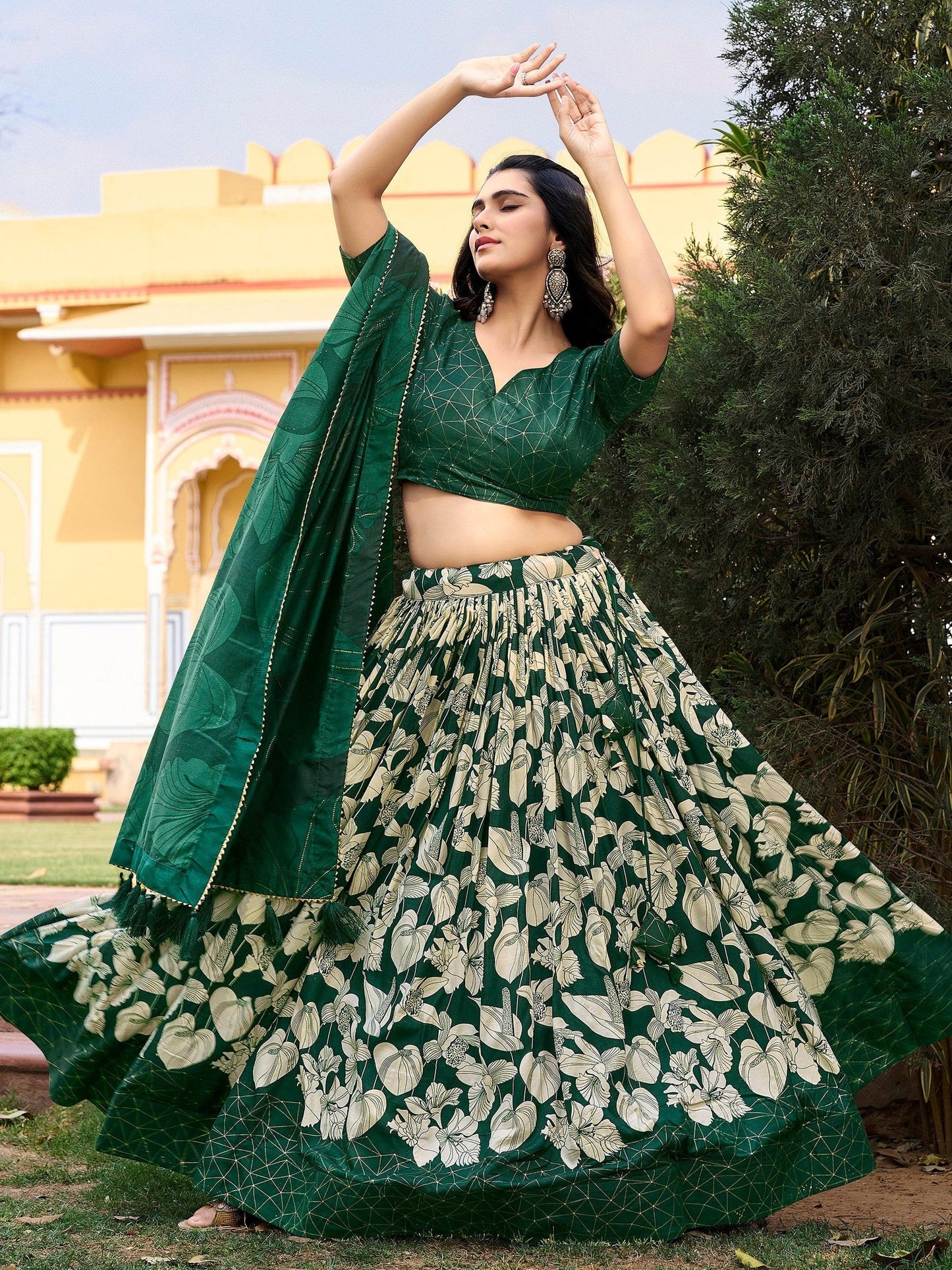 Reception lehenga dark green skirt flare detail with tassels
