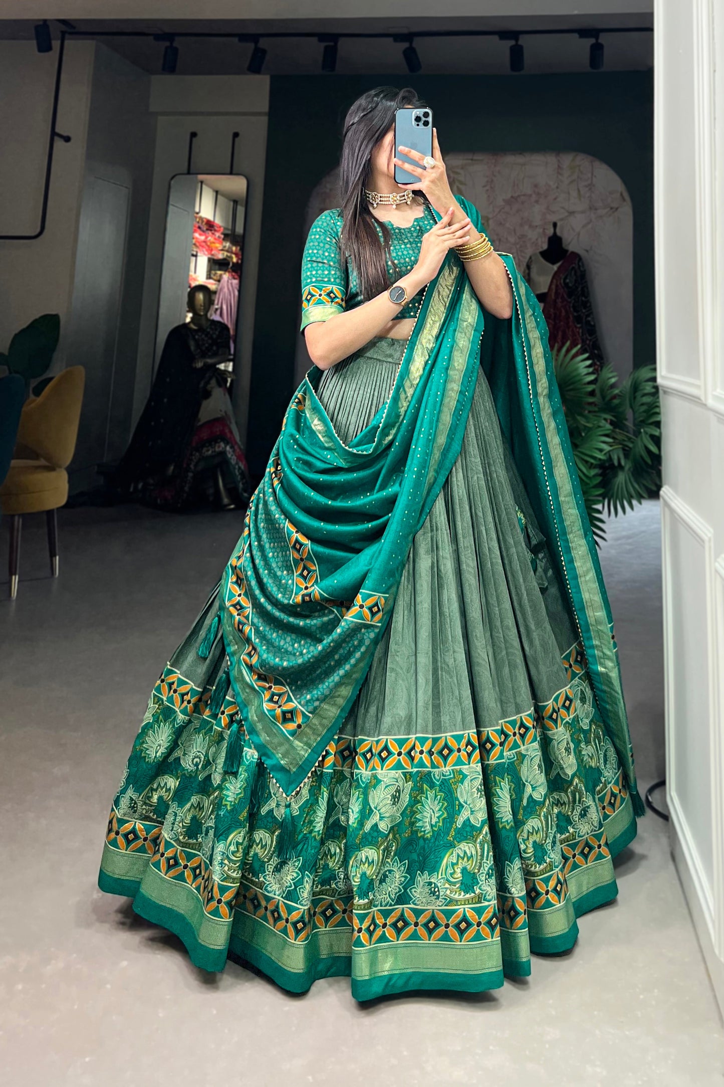 Mint and emerald tone variation in green lehenga design