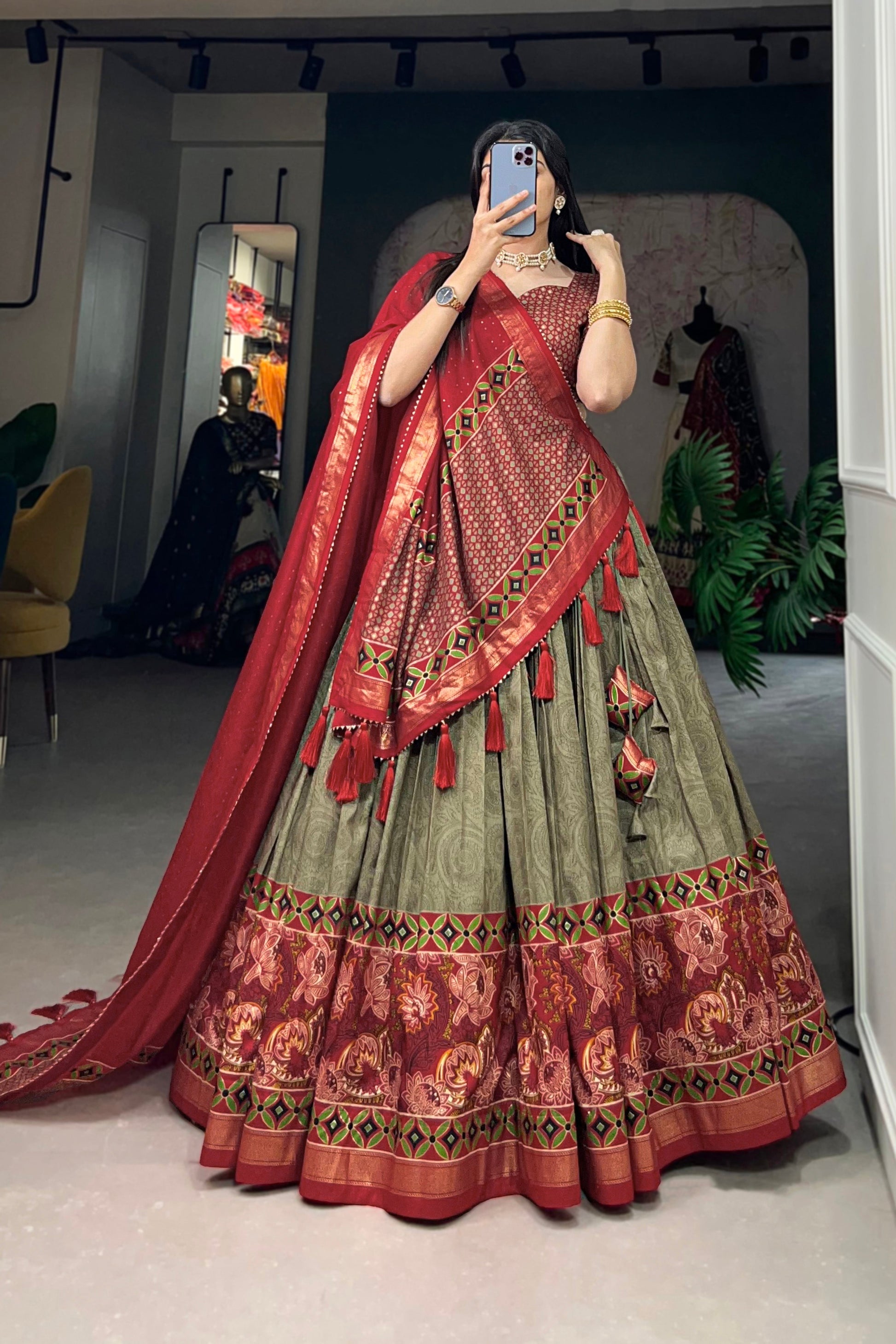 Full outfit of lehenga in green color for festive wear