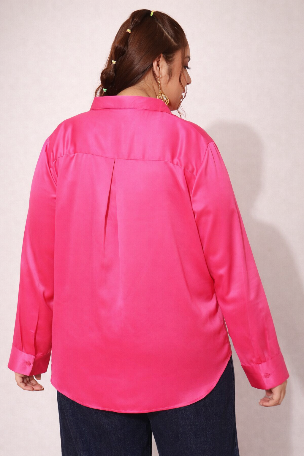 Back view of pink satin shirt showing clean construction
