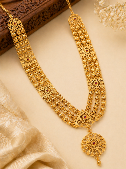 gold filigree necklace with ruby accents