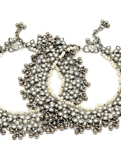 women wearing designer anklet set
