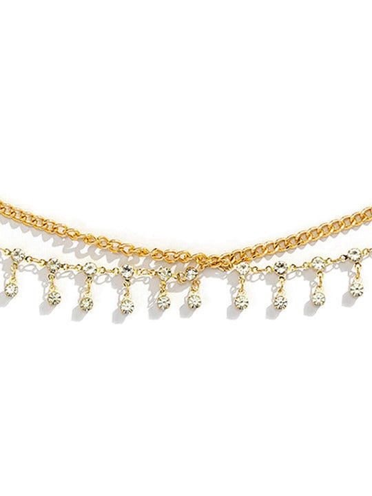 gold tone waist chain flat lay with extension chain