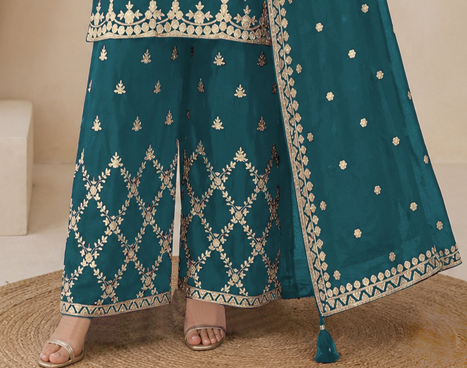 Teal green women’s palazzo outfit styling view