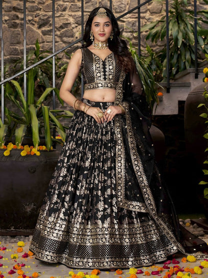 Black lehenga choli with hand work and patch accents