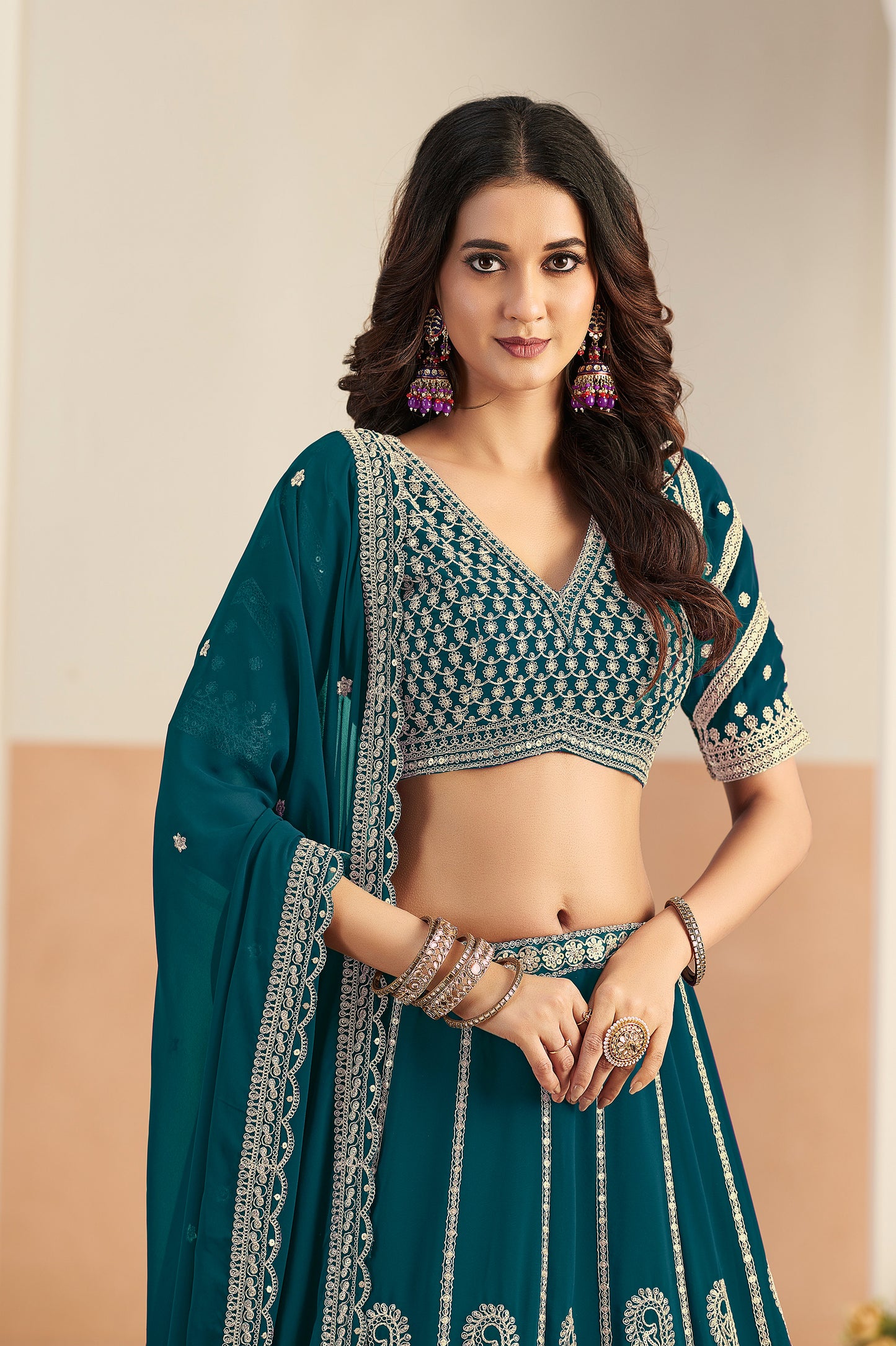 Festive lehenga outfit in royal green front and side angle