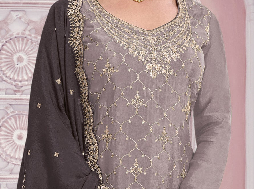 Front angle view of light gray embroidered palazzo dress