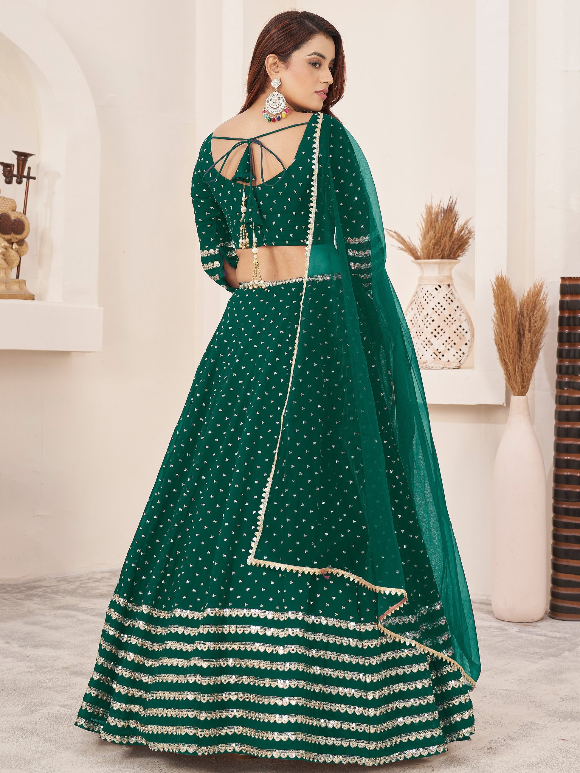 Sequins detailing on dark green lehenga skirt panel