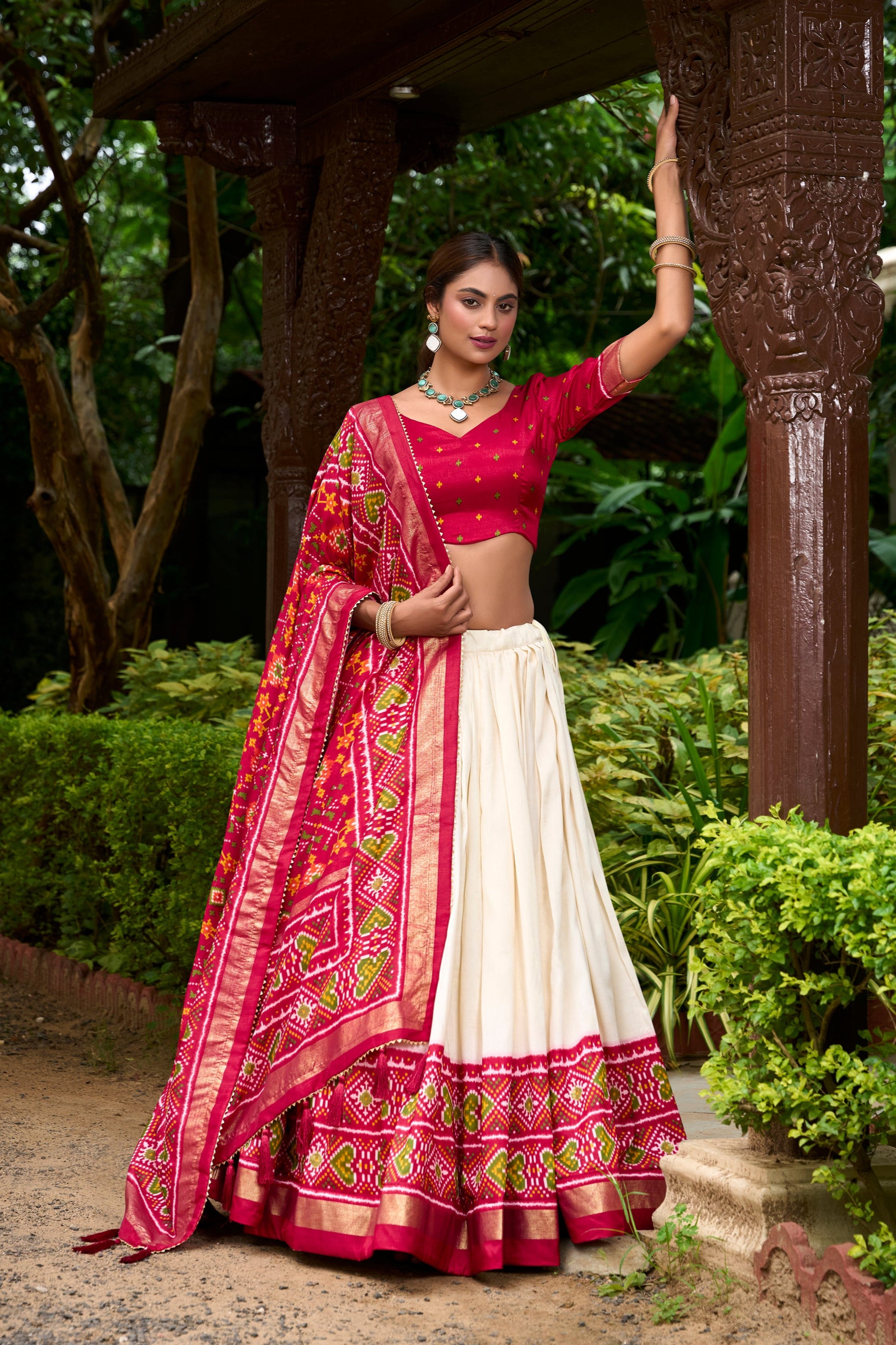 Foil print highlights on red bridal lehenga