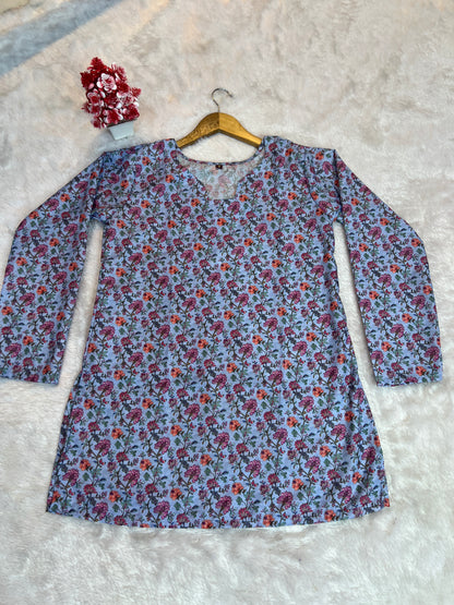 Casual weekend outfit featuring blue women’s tunic top