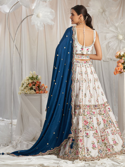 Back view of white lehenga choli with mirror accents