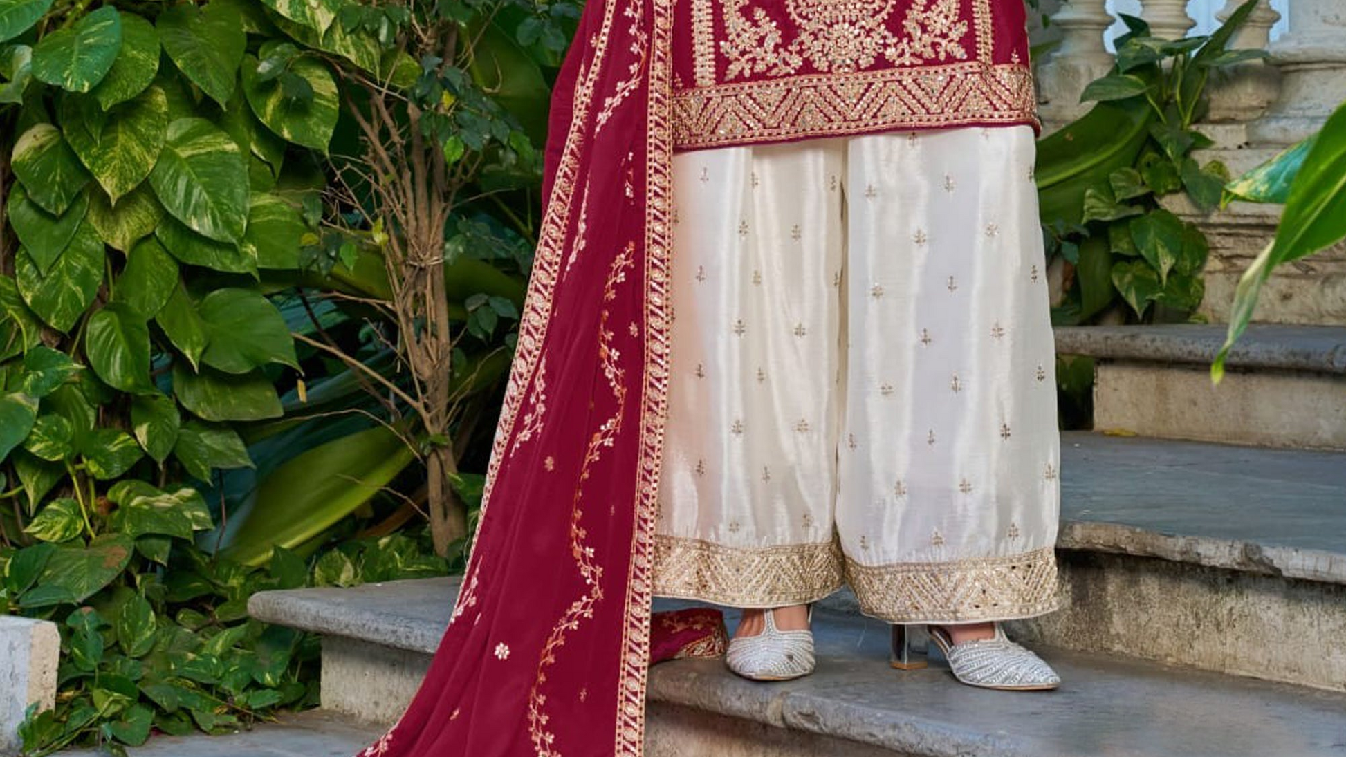 Woman wearing Wide Leg Palazzo Pants with festive maroon dupatta