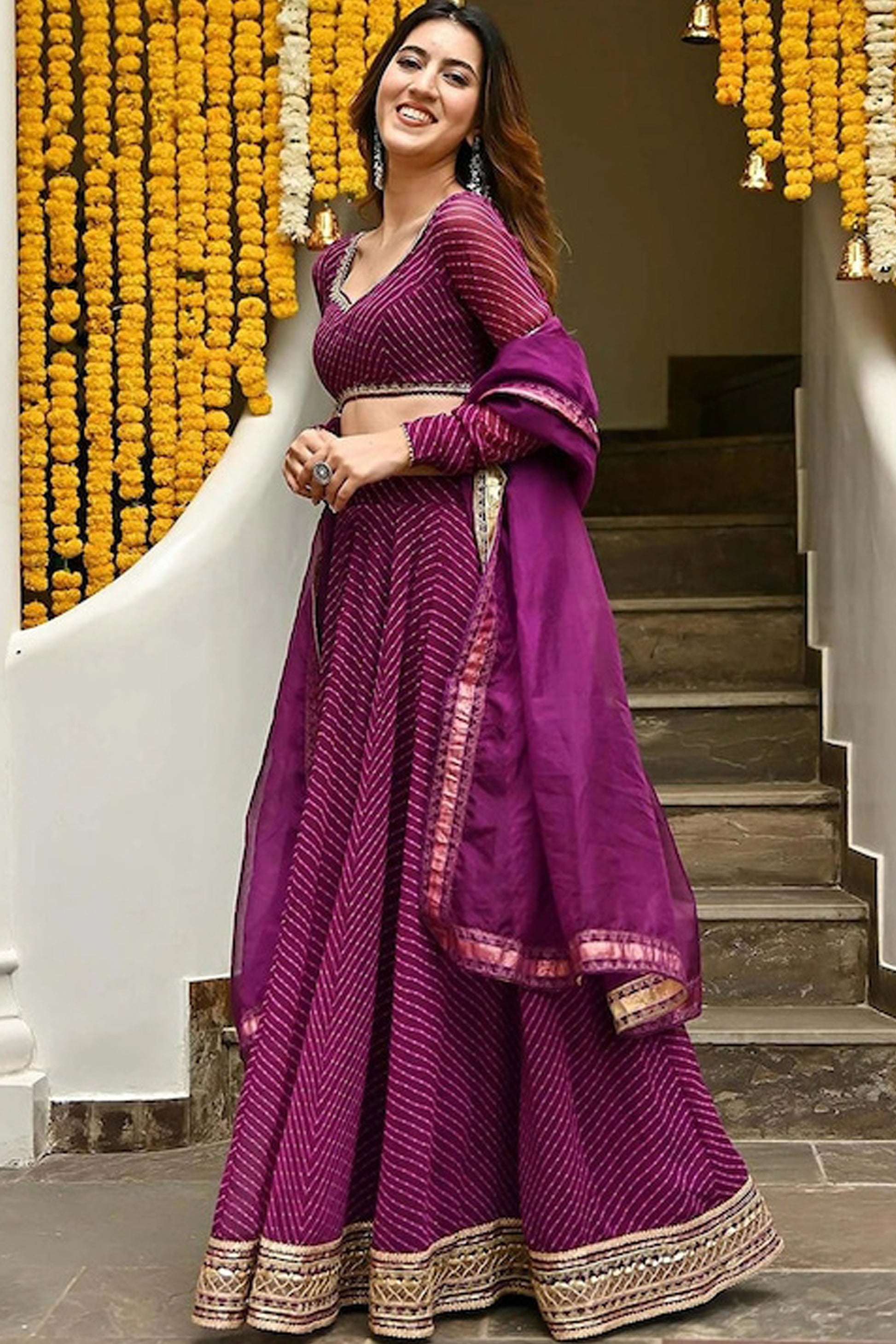 Wine lehenga choli styled for Eid celebration