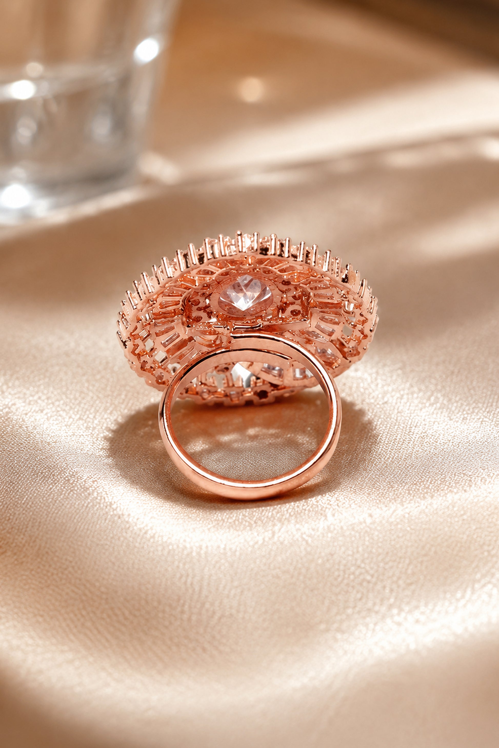 Rose gold tone cocktail ring with sculpted profile