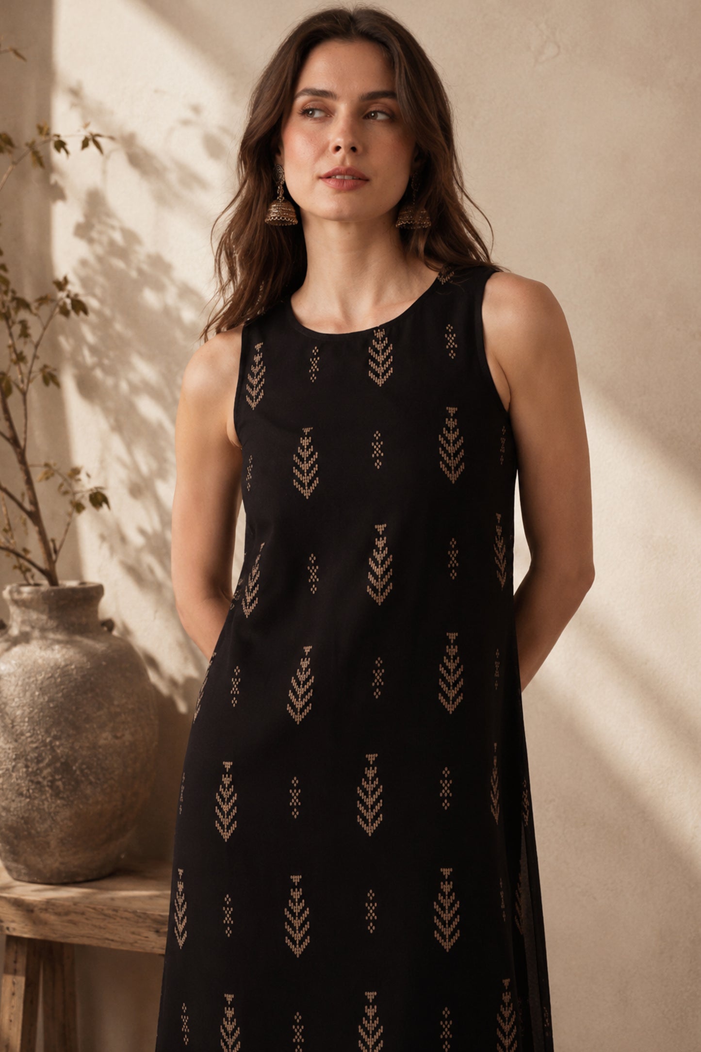 Front view of ethnic motif printed women kurta set