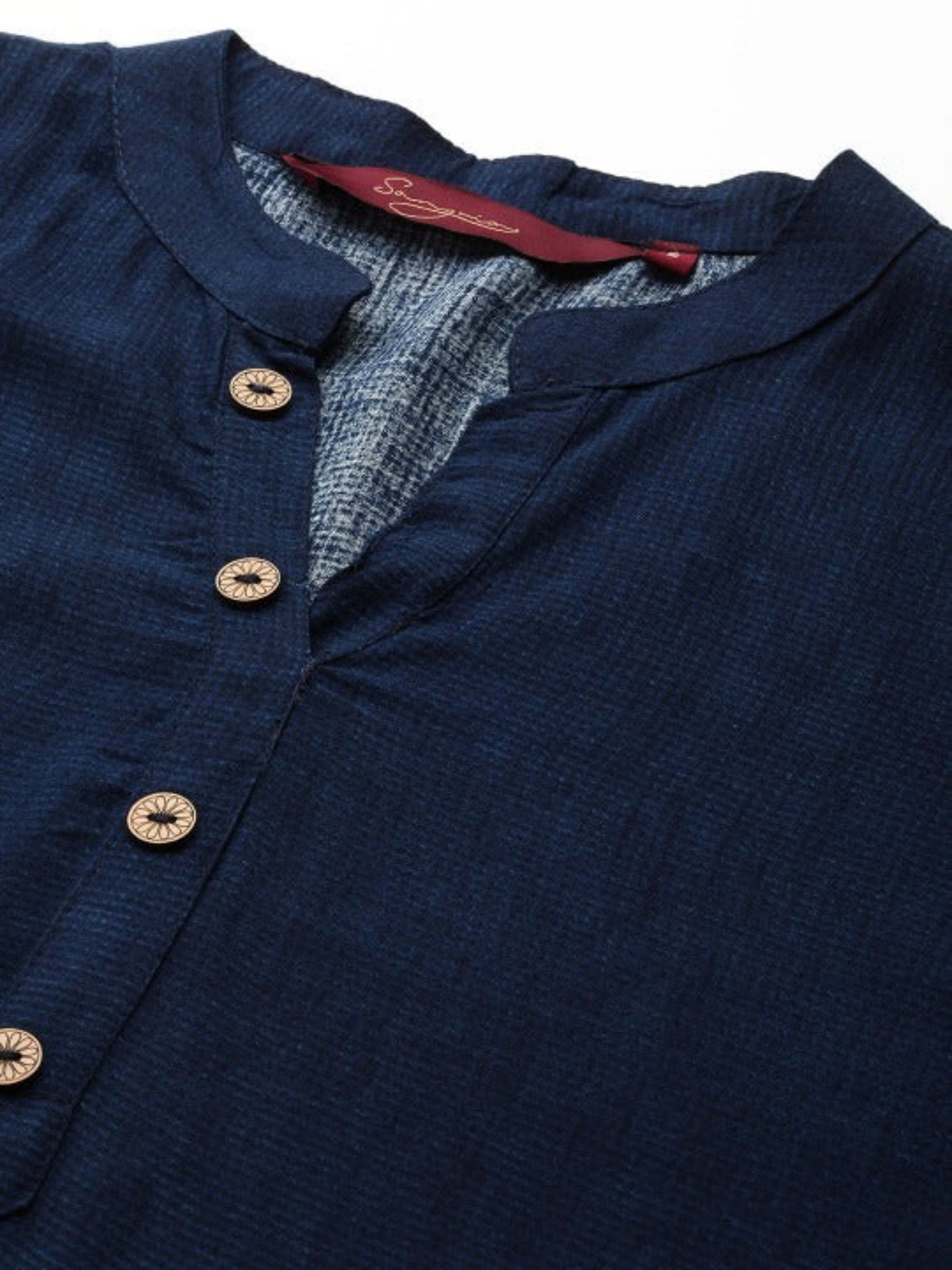 close-up of printed surface on navy tunic top