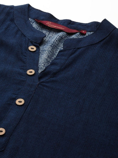 close-up of printed surface on navy tunic top