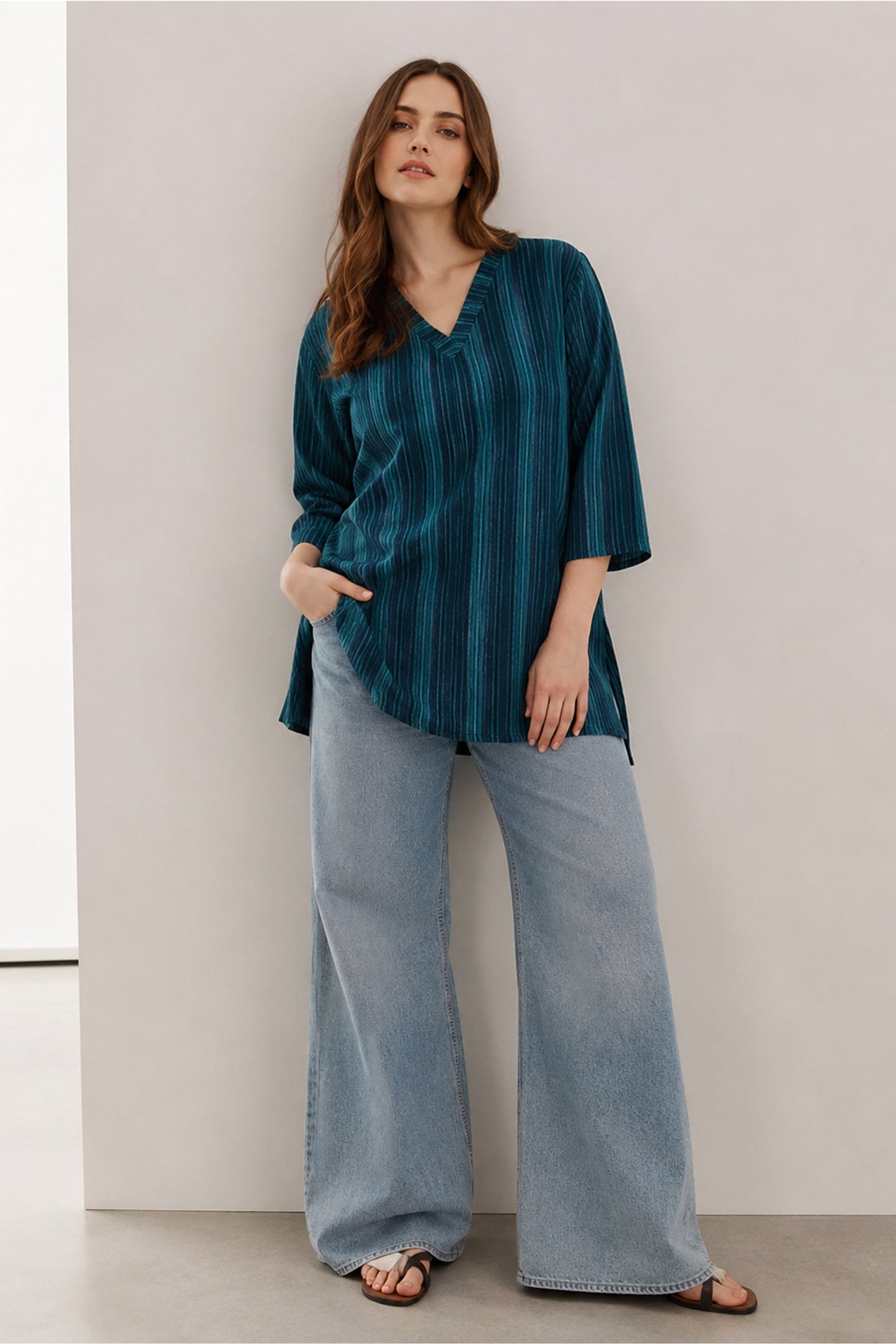 women tunic tops paired with light denim jeans outfit