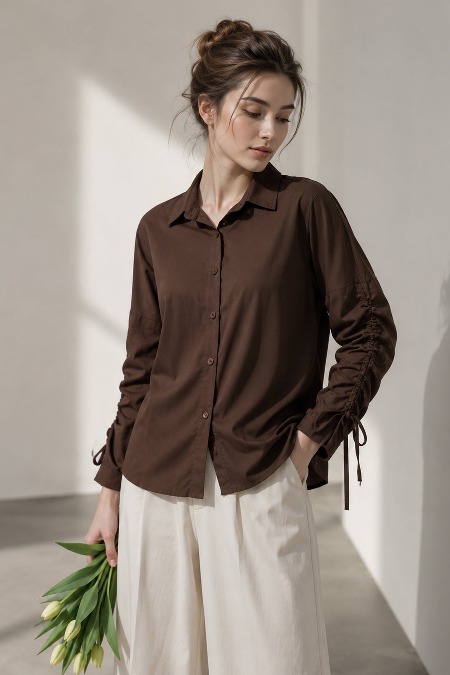 Brown women’s button down shirt shown from the front