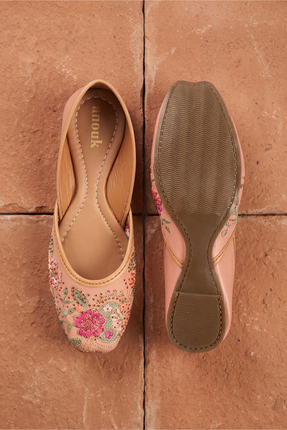 Top view of women's traditional mojarras flats in peach