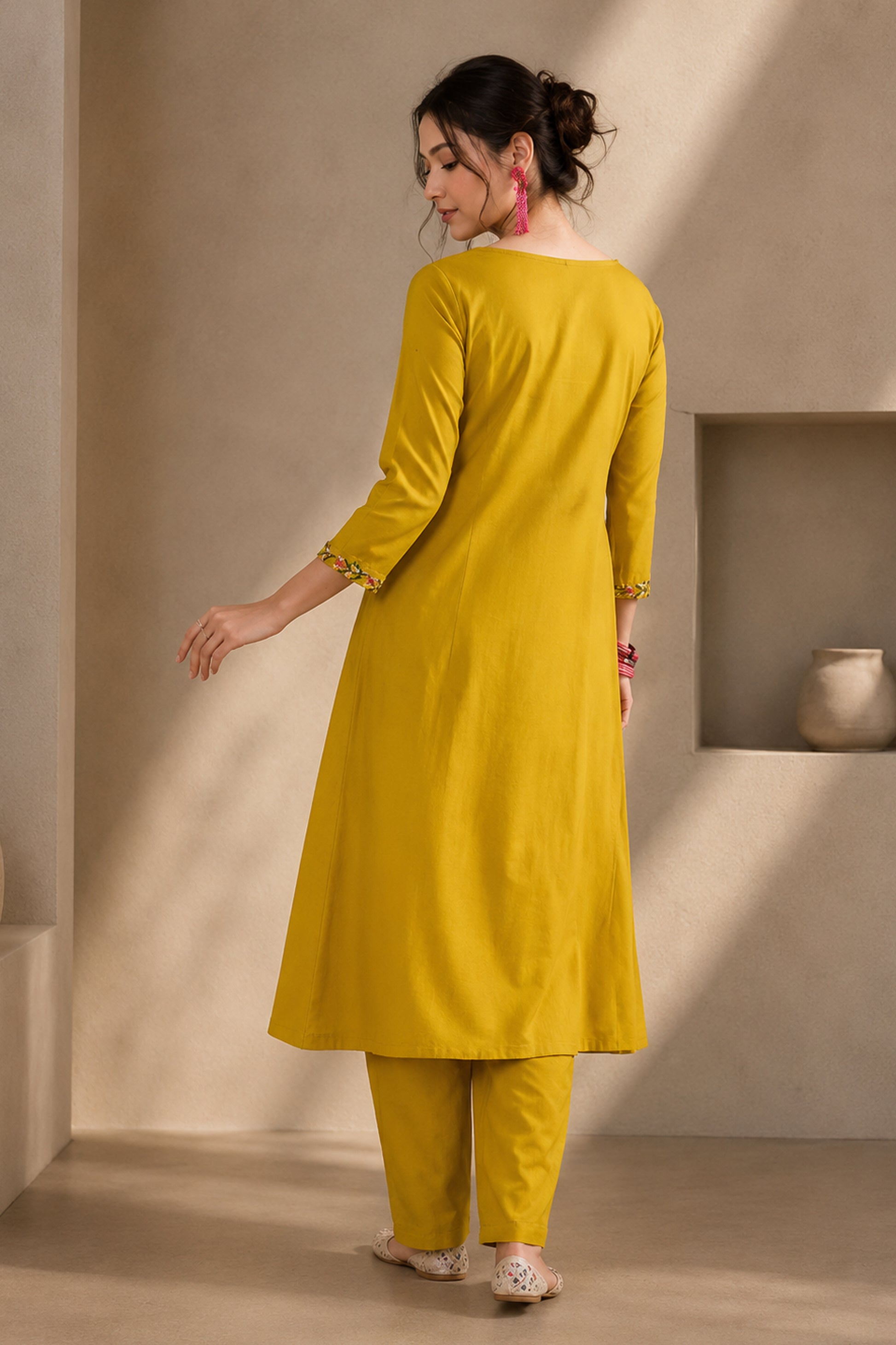 Mustard Yellow kurta set with embroidered back panel