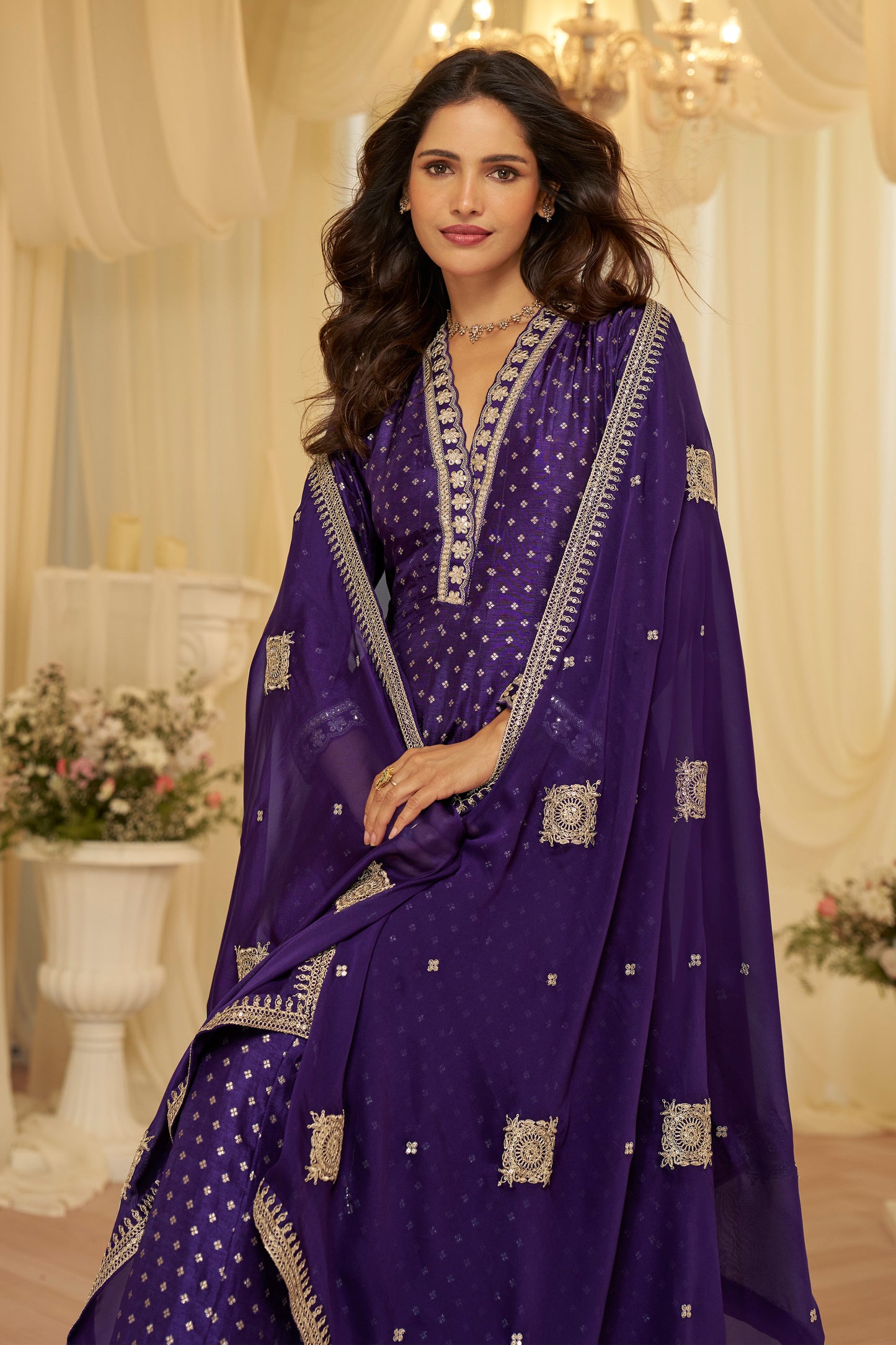 Side view of women’s anarkali suit in purple