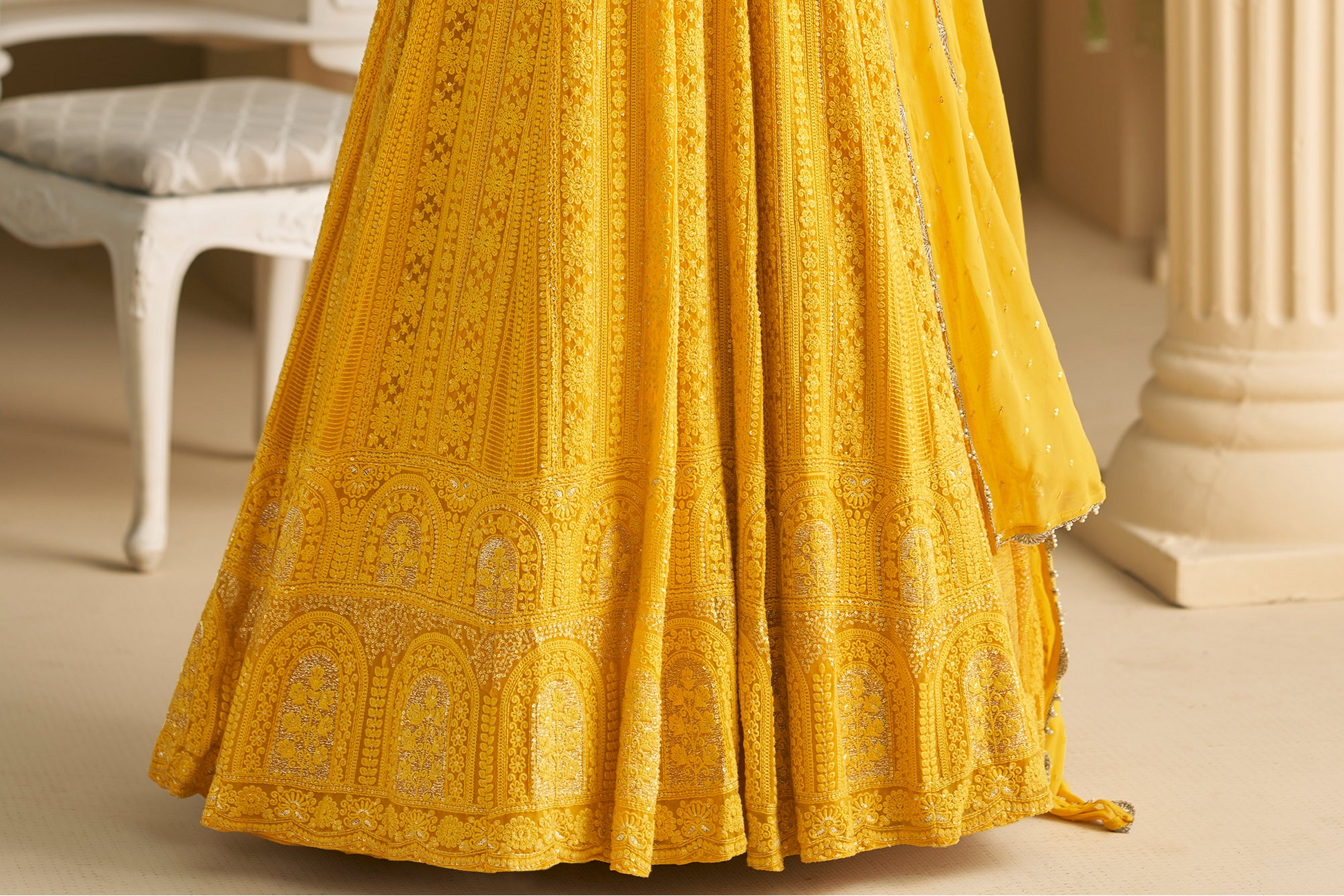 hem detail of yellow anarkali gown