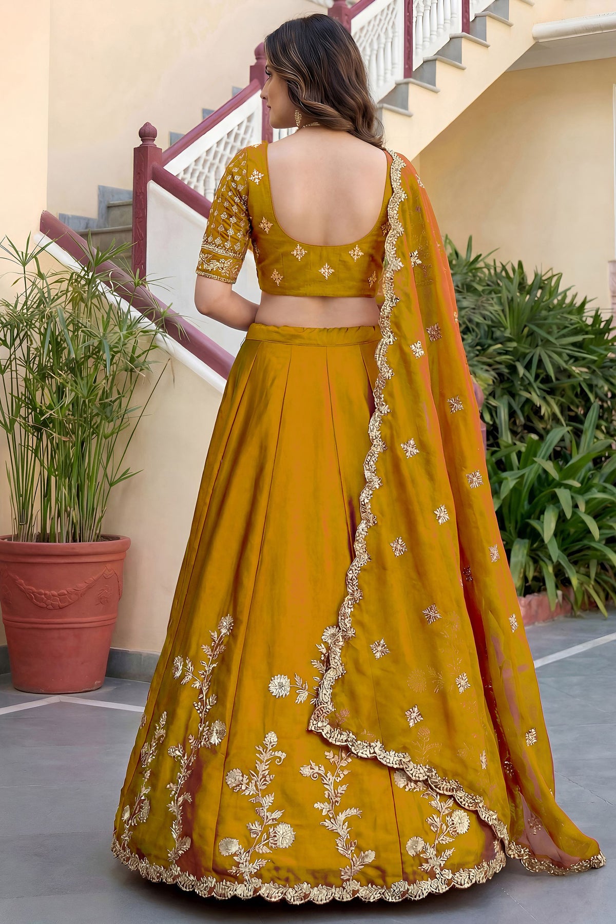 Yellow choli suit back view with matching dupatta