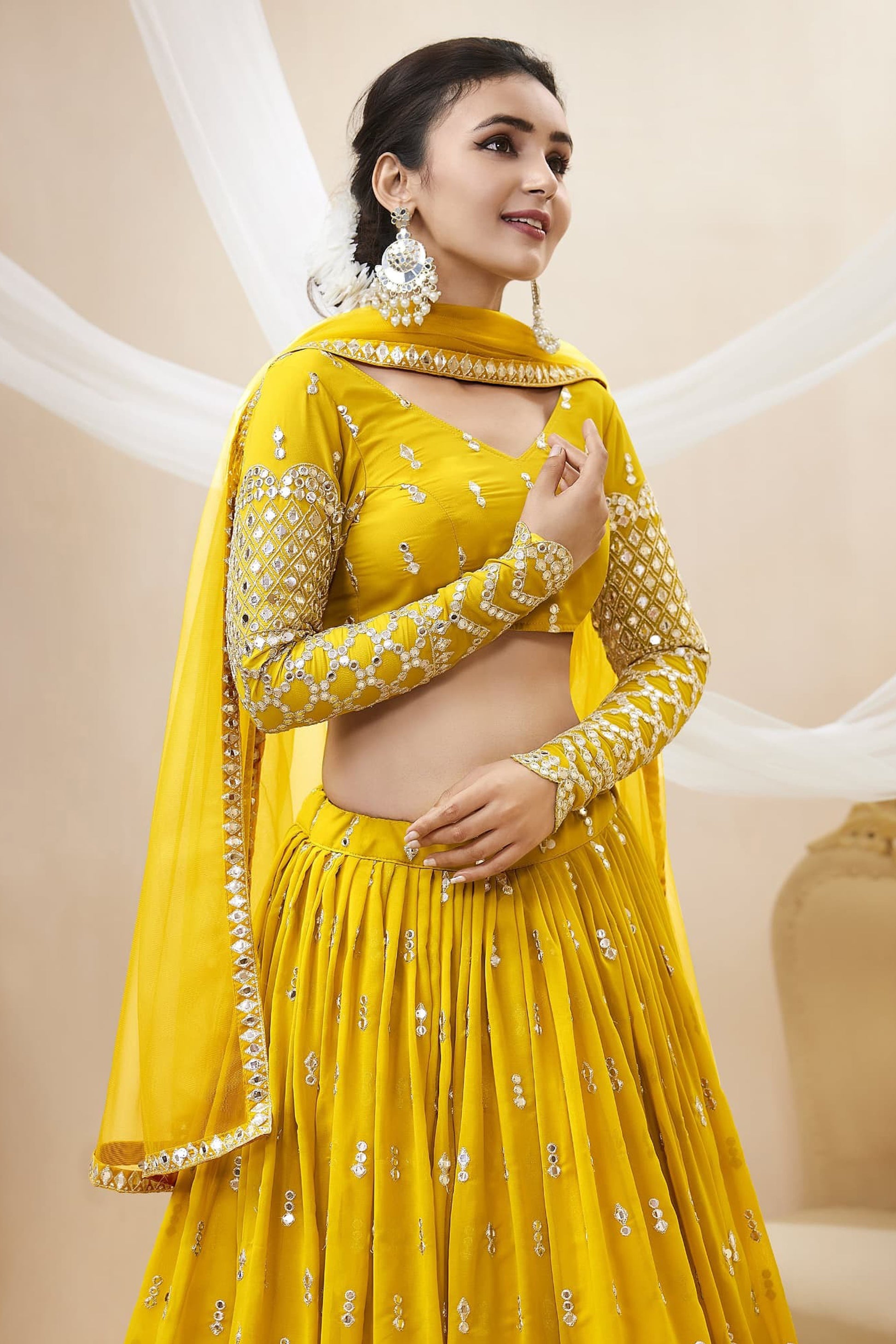 Georgette yellow lehenga choli outfit for wedding reception