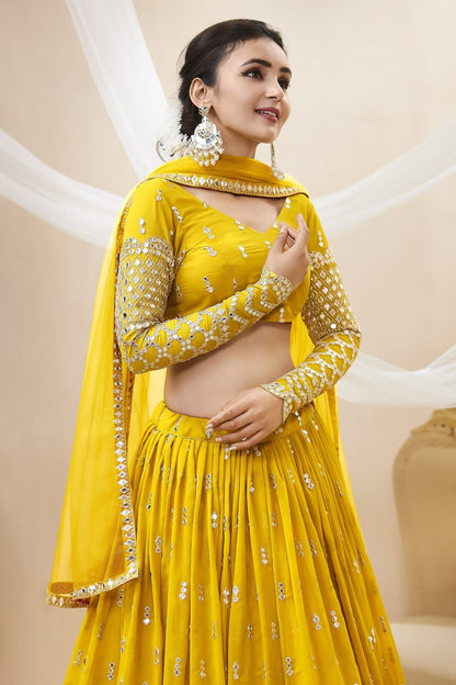 Georgette yellow lehenga choli outfit for wedding reception