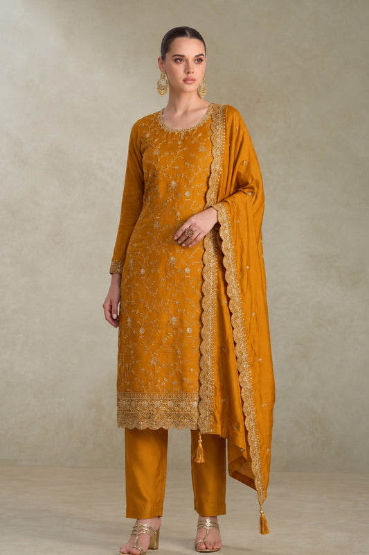 Model wearing Mustard Yellow Salwar Kameez with sequin embroidery
