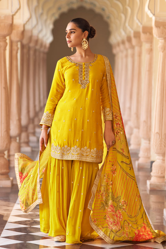 Yellow salwar kameez sharara suit front view with embroidery work