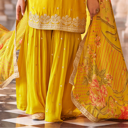 Yellow kameez and sharara set for wedding event styling