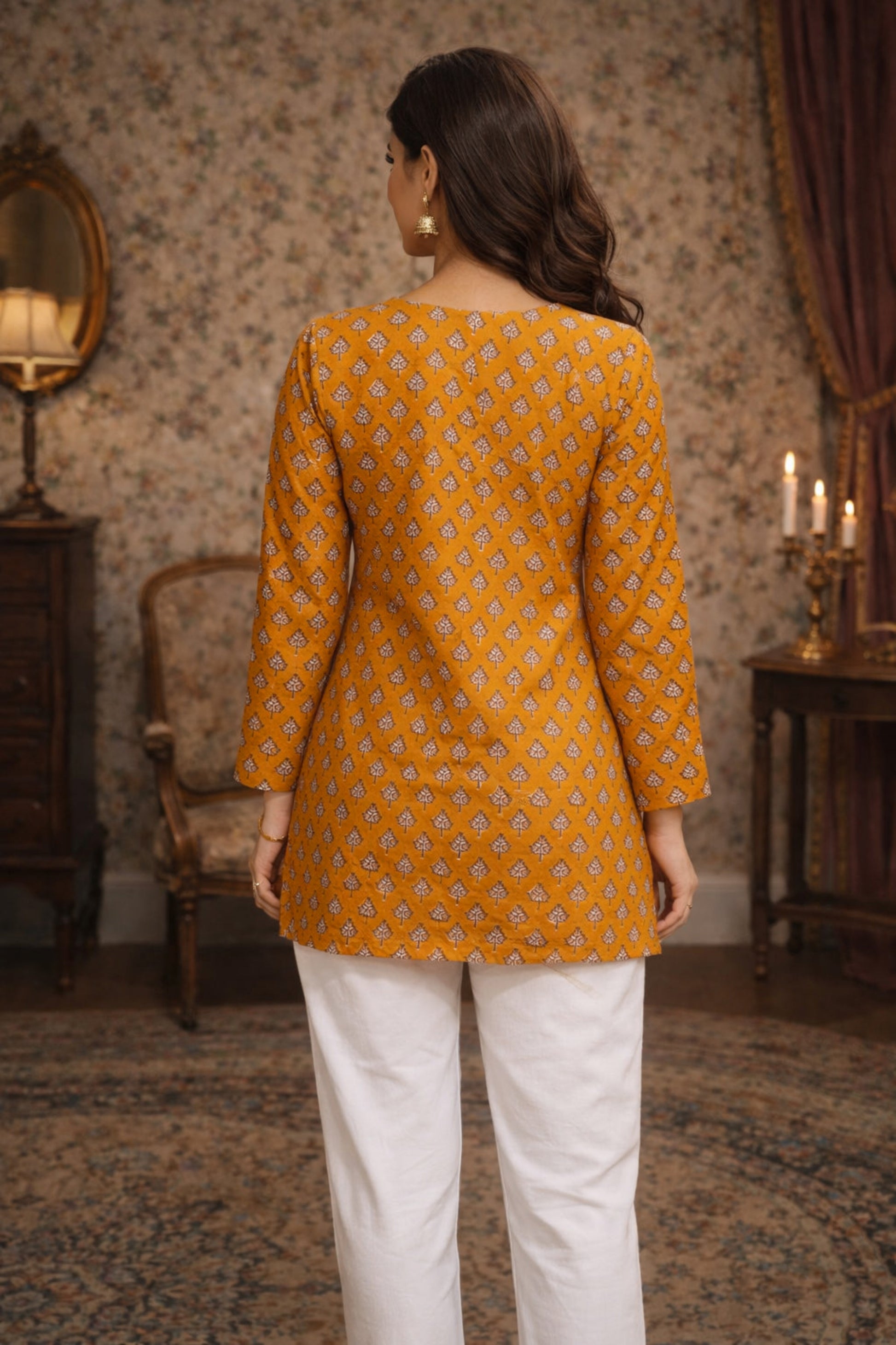 Yellow top back view showcasing print placement