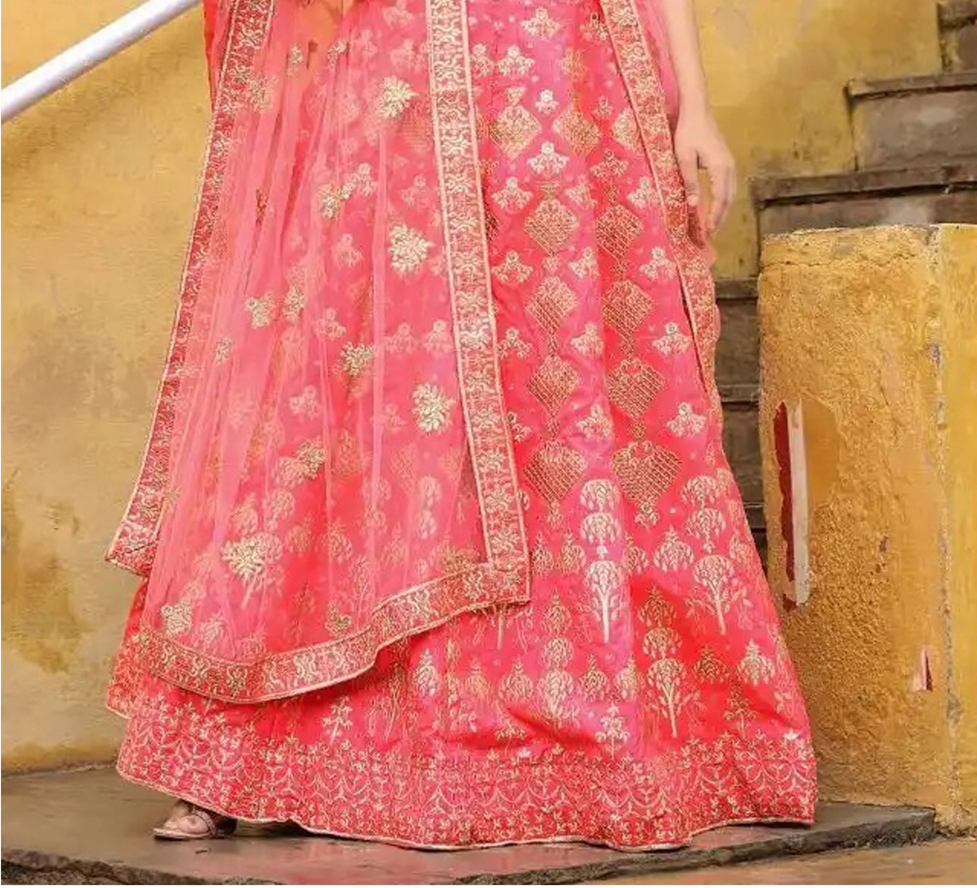 Close-up of zari dori sequins embroidery on georgette lehenga