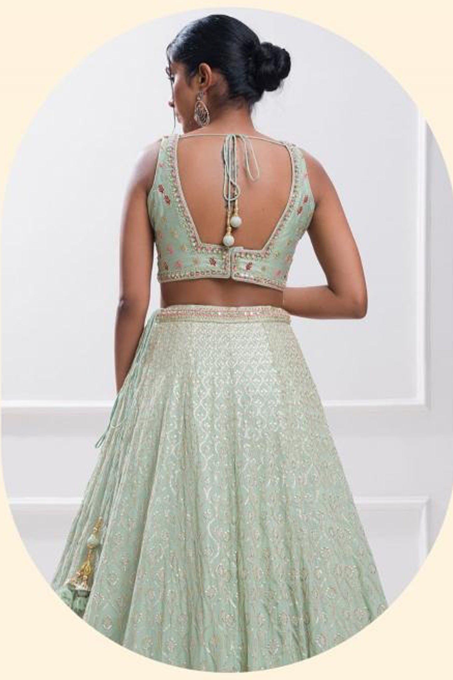 Zari and dori embroidery detail on mint green lehenga