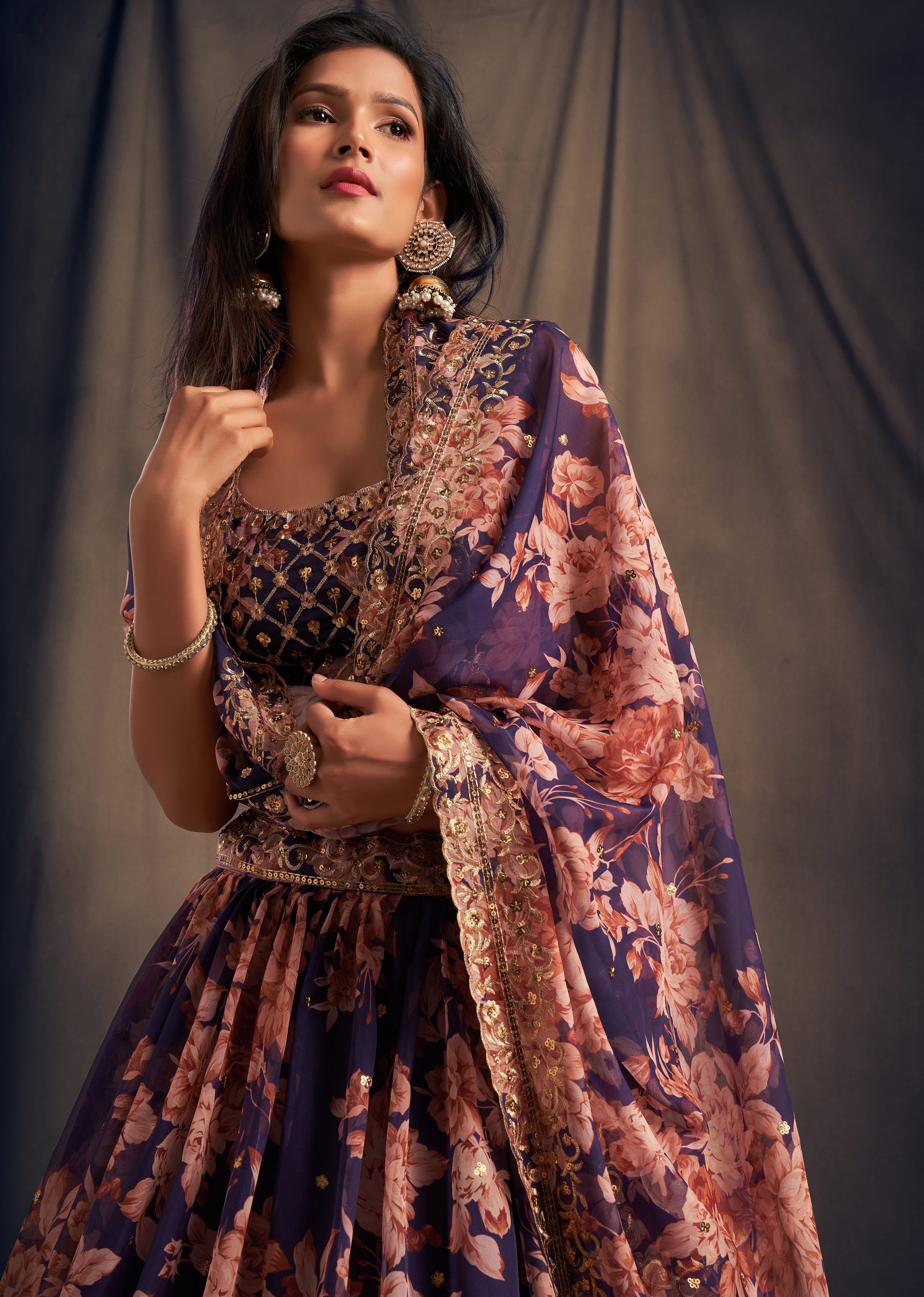 Close-up of organza fabric layers in purple lehenga