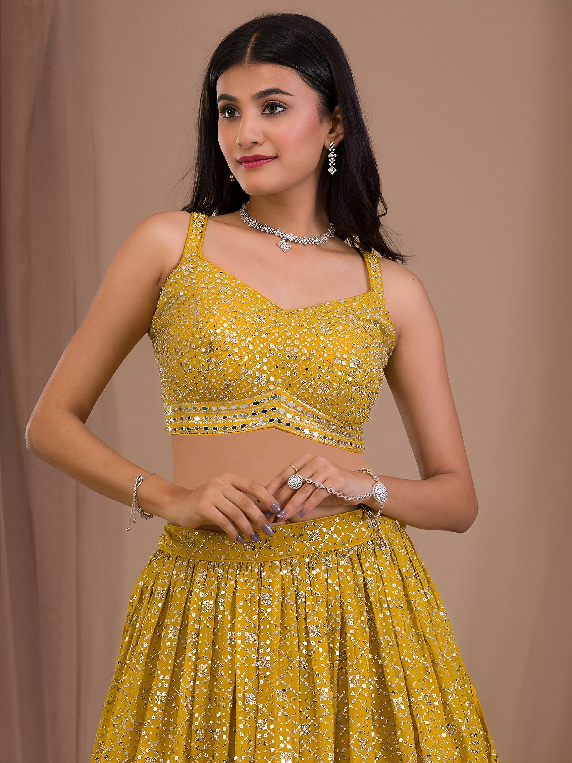 Zari and multiple sequins embroidery work on lehenga choli