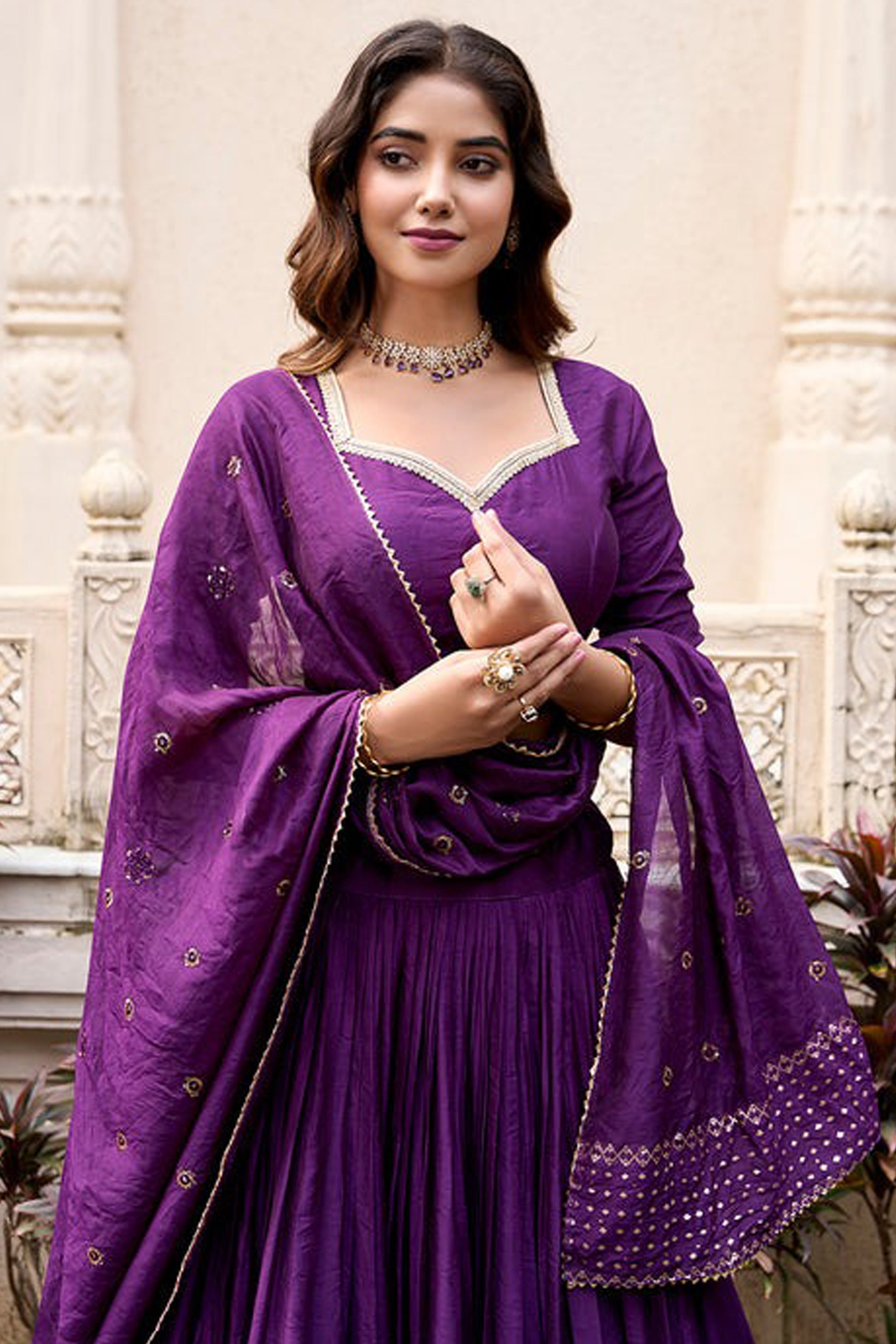 Close-up of intricate zari weaving on lehenga skirt