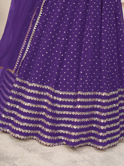 Purple festive lehenga choli with intricate handwork