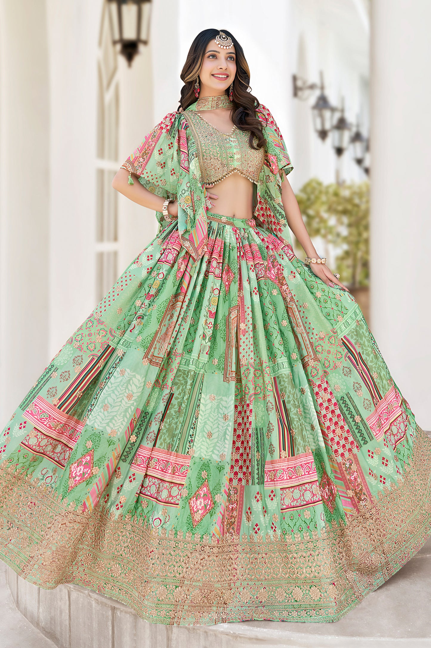 Teal green lehenga skirt with zari embroidery surface detail