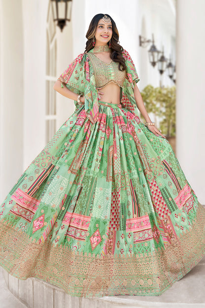Teal green lehenga skirt with zari embroidery surface detail